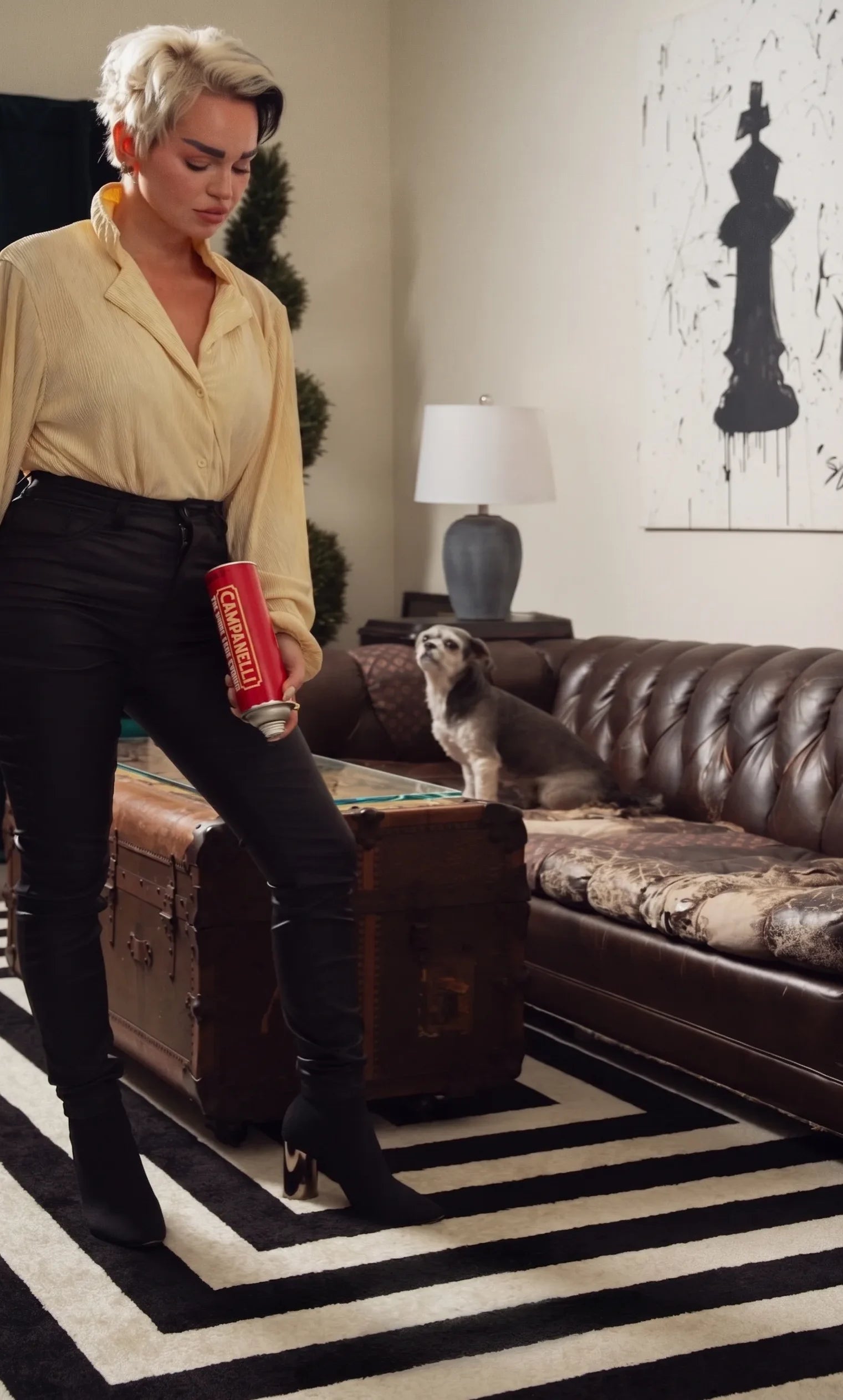 Woman about to spray a carpet stain